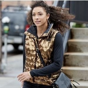 The North face Holladown Metallic Gold Crackle Down Vest Size M.
